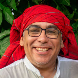 Tata Julio Reyes Aguilar is a Mayan ajqij and spiritual guide from El Salvador. He is an architect and urbanist