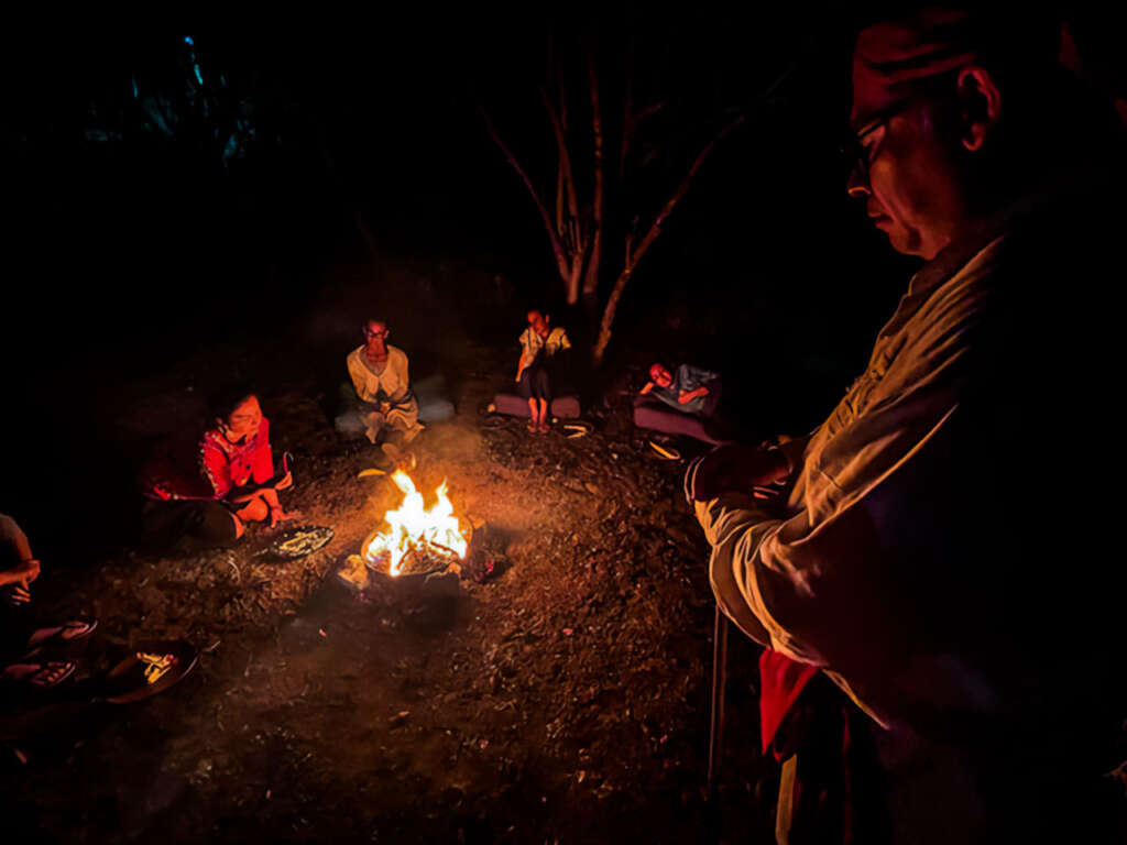 Indigenous medicine shamanic gropu retreat for healing ancestral lineage and karma. Tata julio and participants are doing healing work